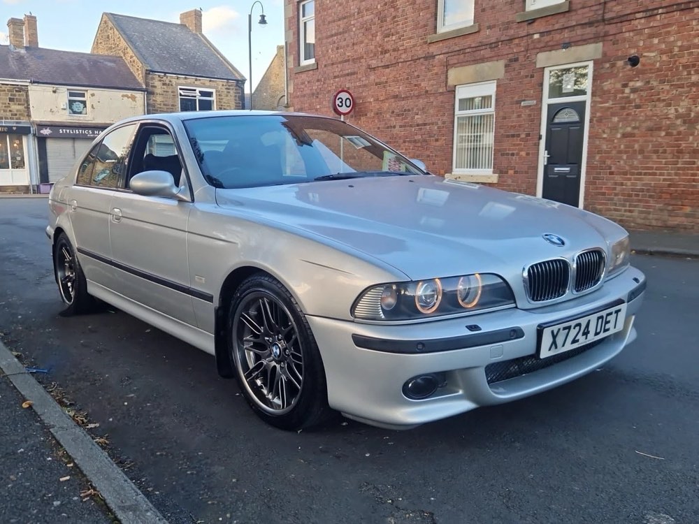 The M5 on its Style 65 M wheels, kept as BMW built it.